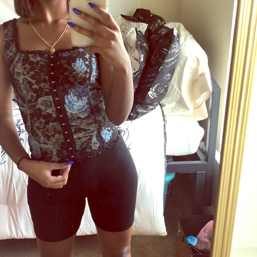 Black lacy blouse with hooks down the middle